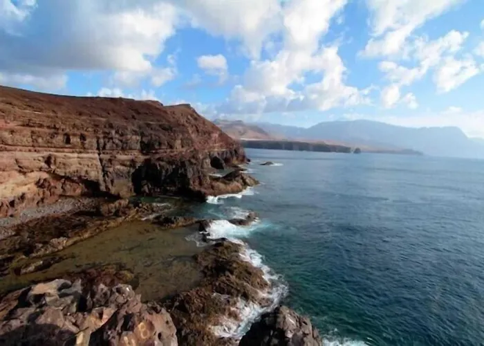 Vista Faro Sardina 公寓 *